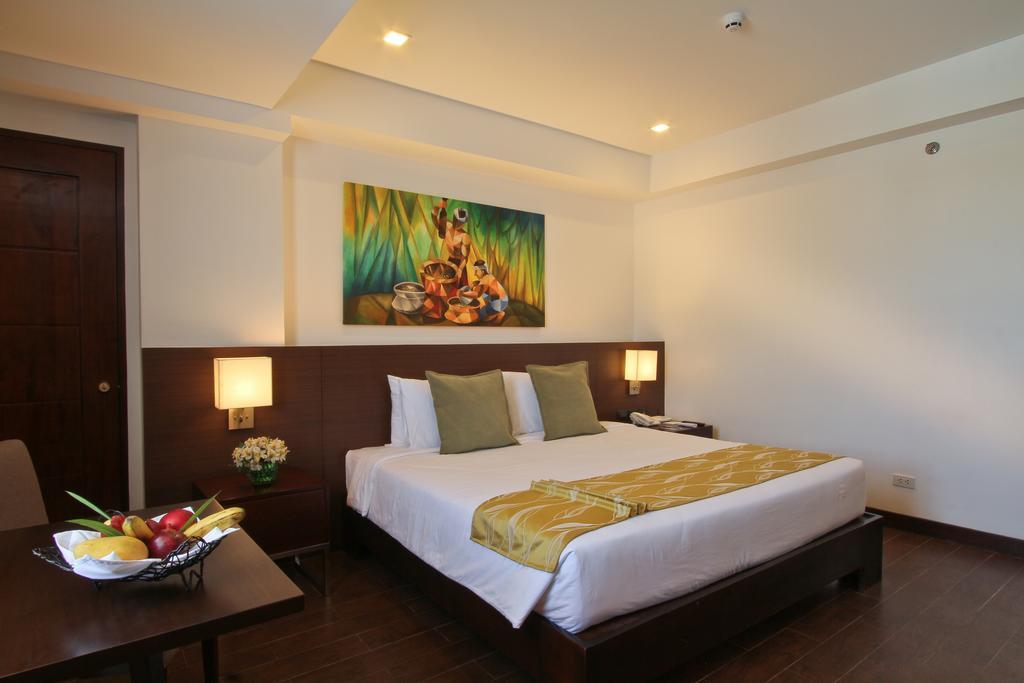 The Harvest Hotel Managed By Hii Cabanatuan City Exterior photo